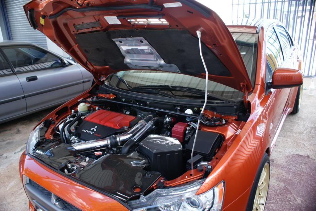 Rotor Glow Orange Evo X in Puerto Rico by AutoLavish